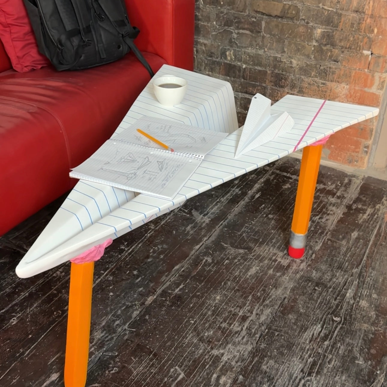 The Lined Paper Airplane Table